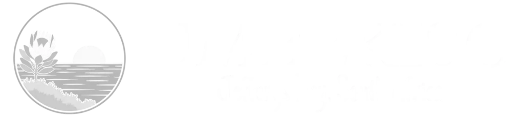 White Umbekiso brand logo featuring a circular Protea and ocean icon on the left, with the company name 'UMBEKISO' and 'Jefferys Bay, South Africa' written to the right